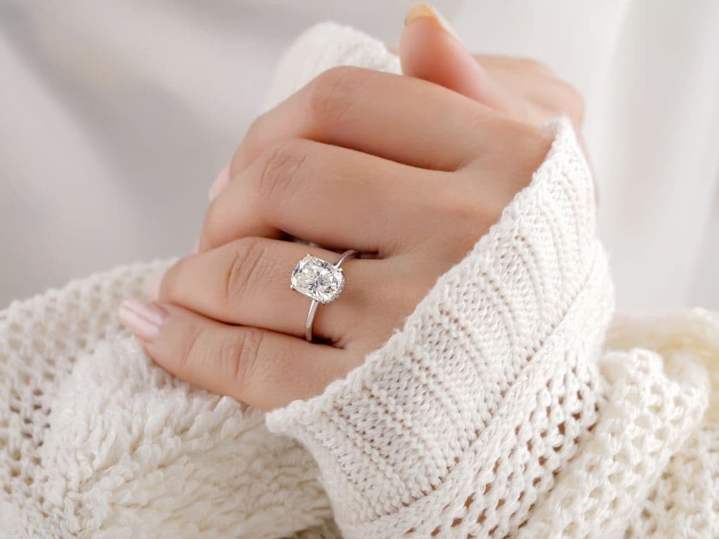 lab grown diamond ring on a woman's finger